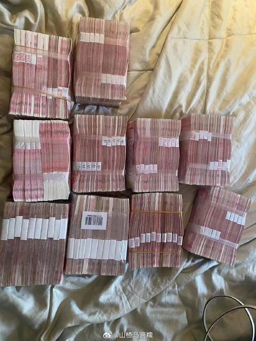 新版人民币1万有多少斤/新版人民币一万多厚